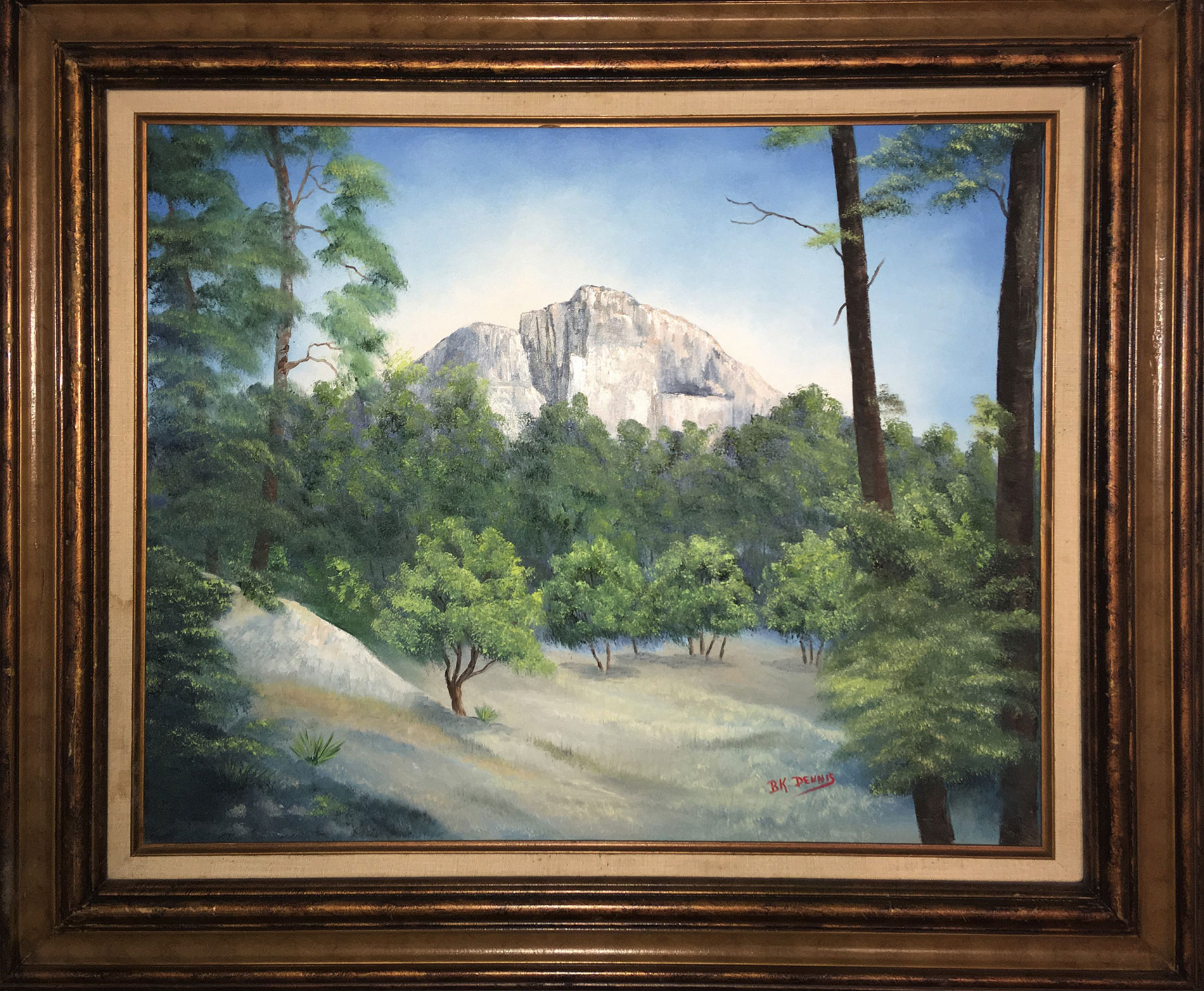 Oil painting of Emory Peak as seen from inside the Chisos Basin in Big Bend National Park. Painted by B.K. Dennis of Alpine, TX.